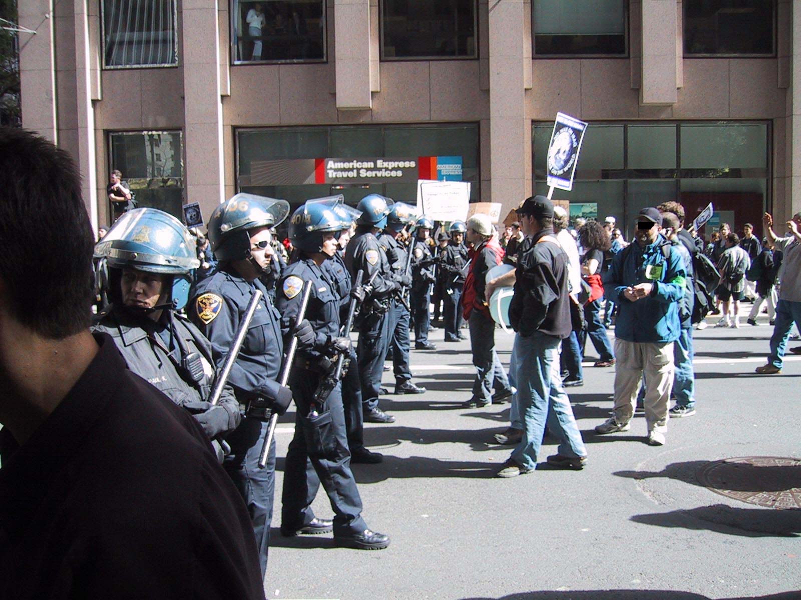 Cops Push Back Protestors